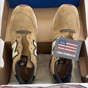 New Balance Beige and Black Sneakers